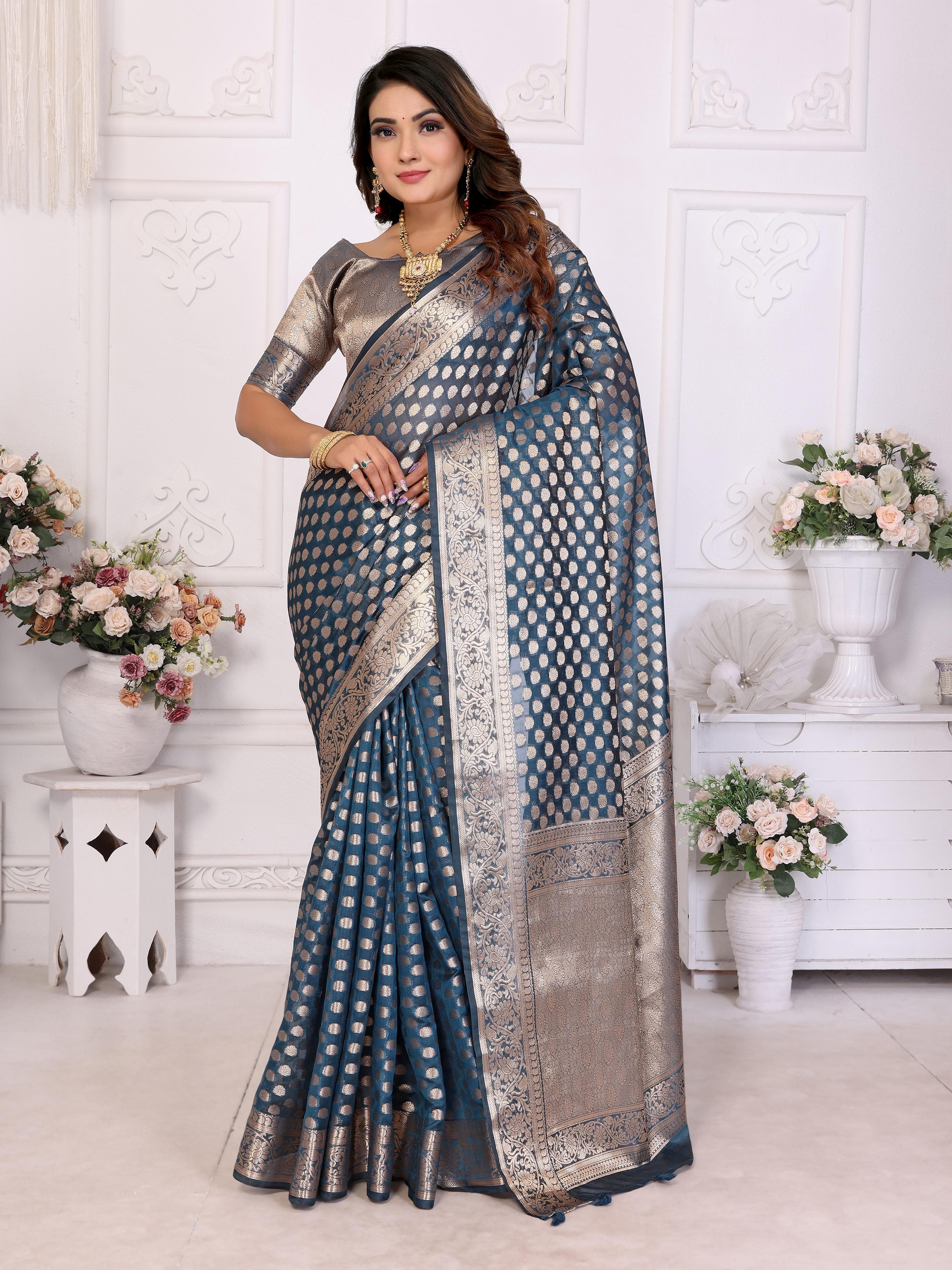 Cyan Blue Soft Organza Silk Banarasi Saree with Gold Jari Border & Intricate Weaving Butti Cyan Blue Soft Organza Silk Banarasi Saree with Gold Jari Border & Intricate Weaving Butti